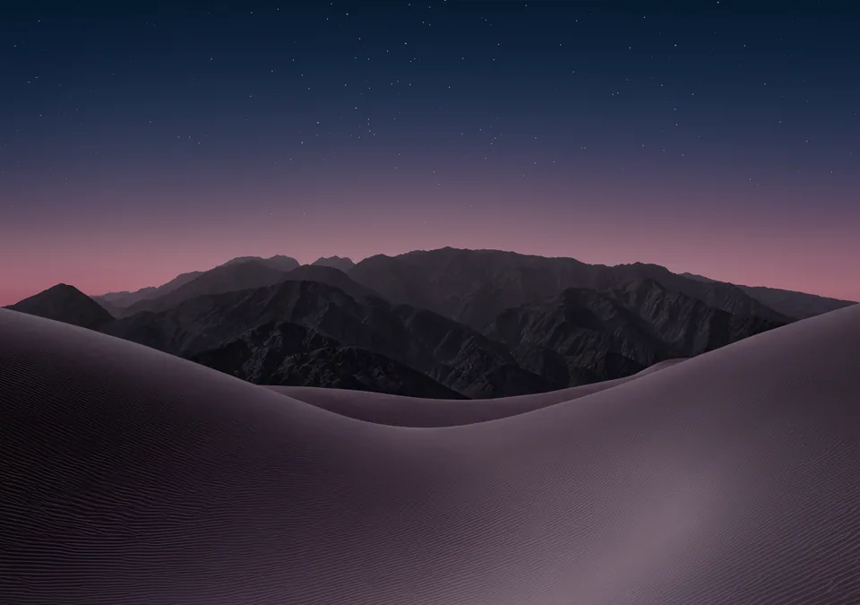 iPhone Duo default inner display Lock Screen wallpaper, dark version: violet sand dunes and dark mountains under a starry dusk sky with a pink horizon.