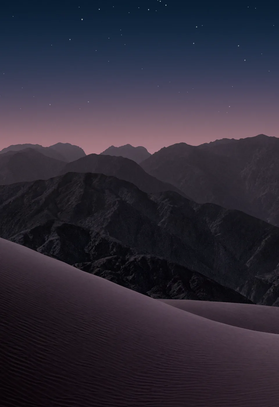 iPhone Duo default outer display Lock Screen wallpaper, dark version: violet sand dunes and dark mountains under a starry dusk sky with a pink horizon.